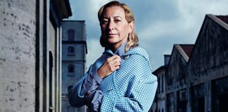 Miuccia Prada outside her foundation's new exhibition complex in Milan designed by Rem Koolhaas.